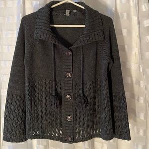 Grey sweater jacket.